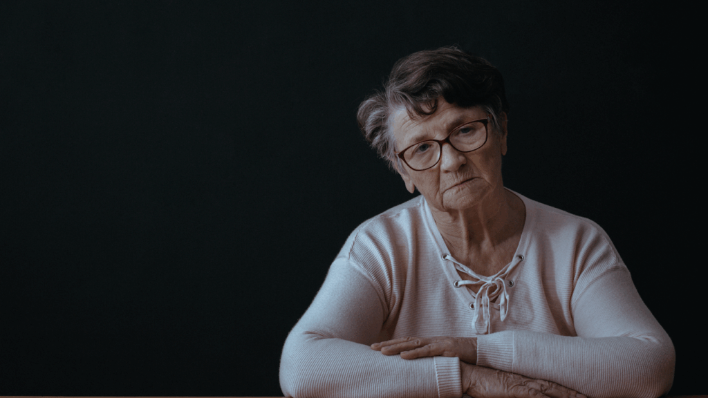 Elderly woman longing for his late veteran husband