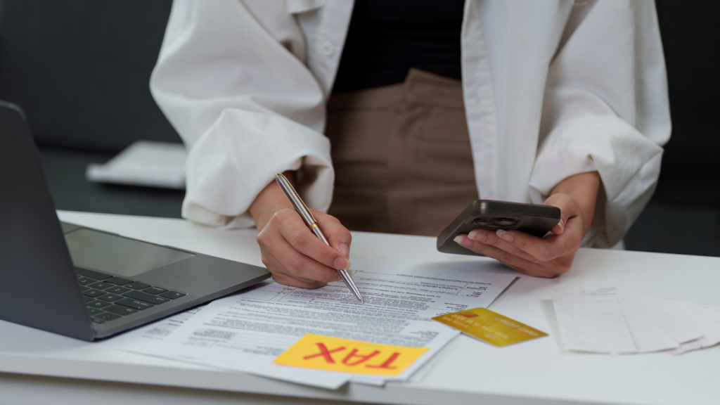 Assessor verifies previous tax records before issuing the new owner a certificate