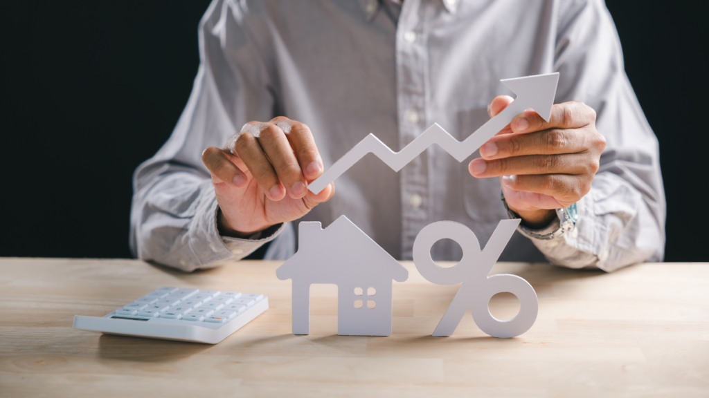 Tax expert holding rising arrow symbolizing increasing property market value