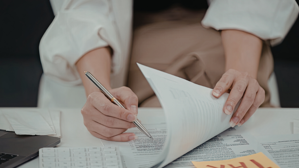 Homeowner organizing evidence documents for a property tax protest