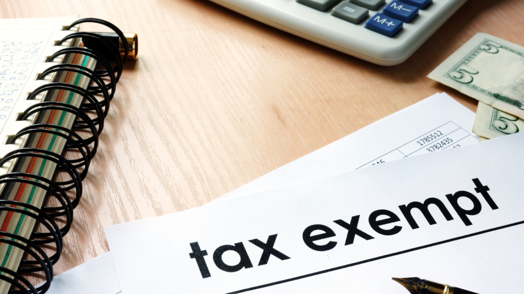 Property tax exemption paperwork on a desk with financial documents