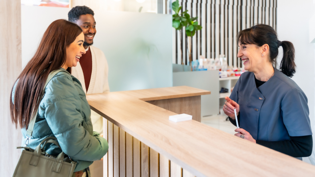Two residents receiving assistance at a local public health center