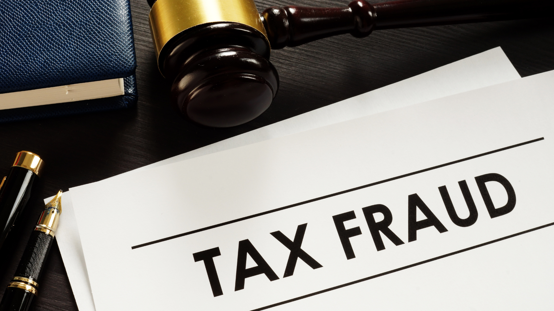 Tax fraud paperwork and judge gavel symbolizing Houston property tax issues