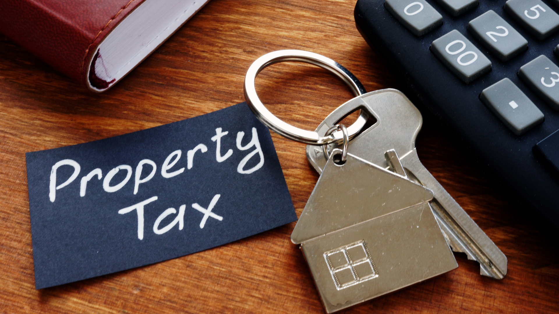 House keys and property tax sign representing Texas tax protest decision