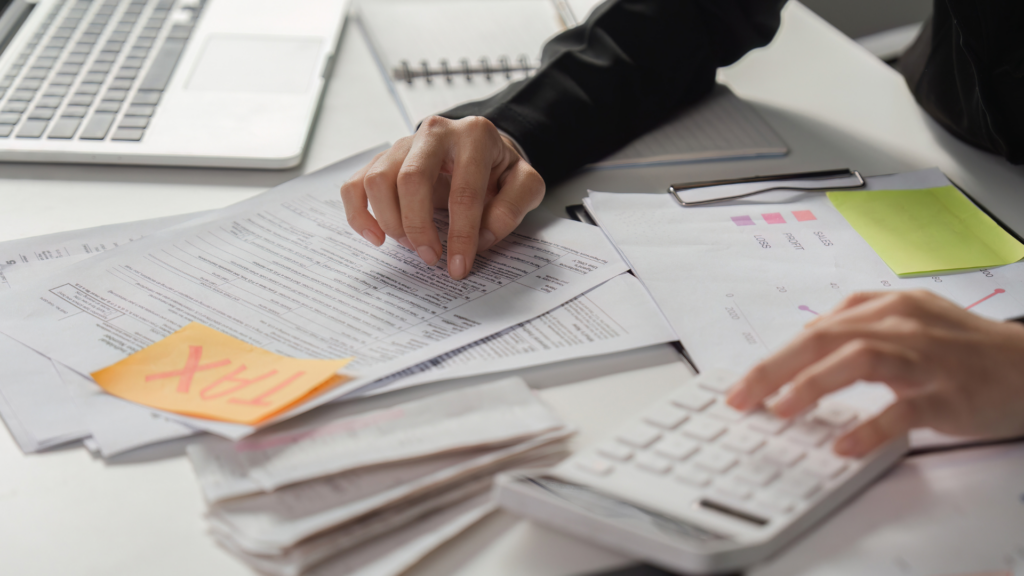 Property owner cross checking tax paperwork against assessment details