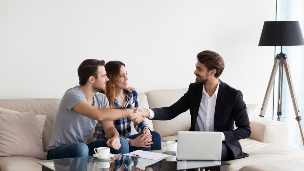 Property owners meeting with a professional consultant to discuss tax protest strategy