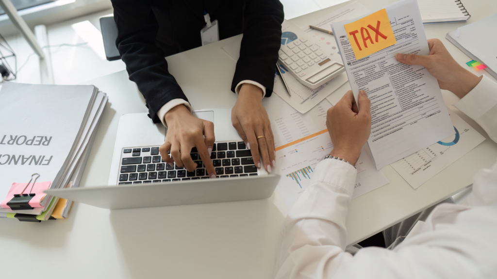 Tax consultant pointing out details on a property assessment form