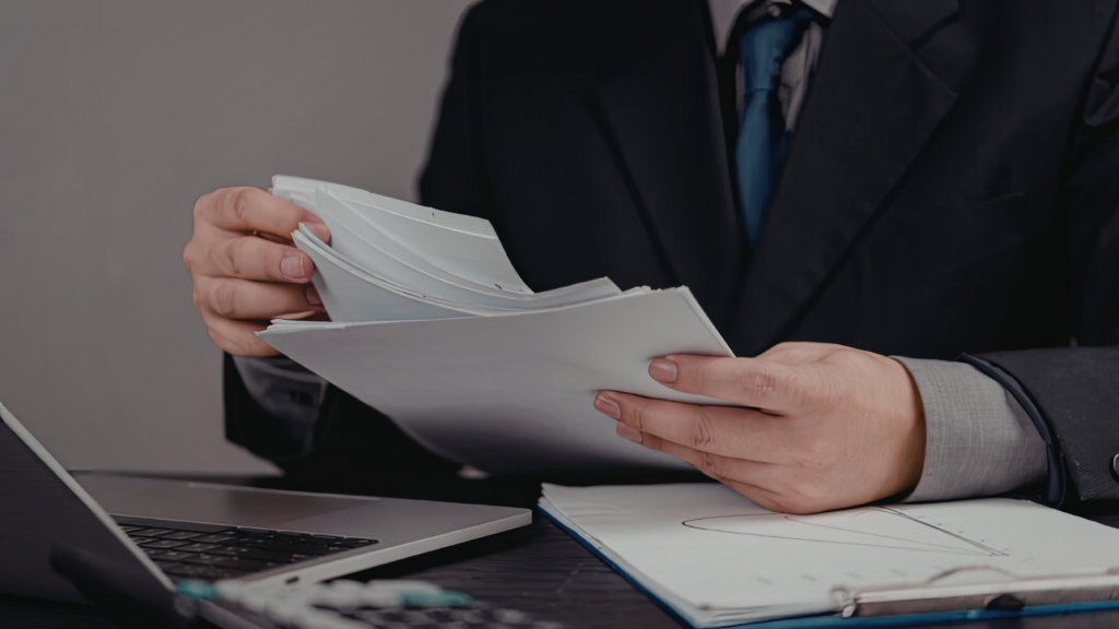 Tax consultant reviewing BPP rendition documents for Texas business filing